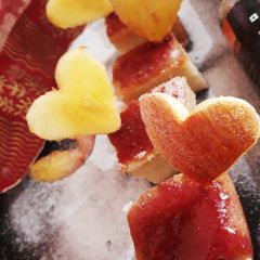 A picture of Apple cake with pomegranate sauce.