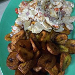 A picture of Fried plantain and scrambled eggs.
