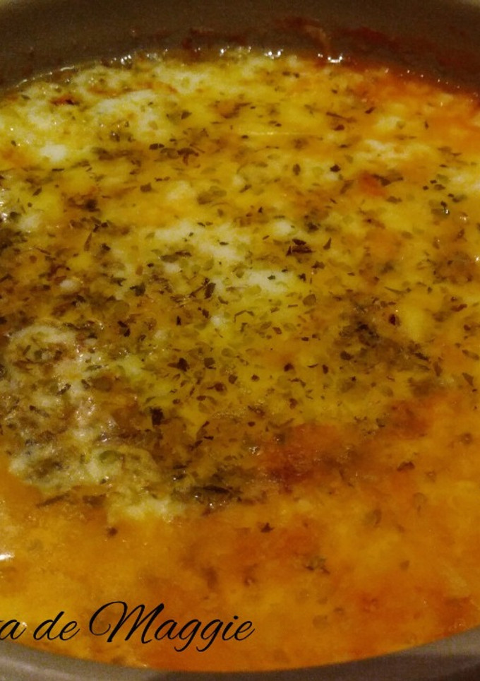 Una foto de Provolone con tomate al horno