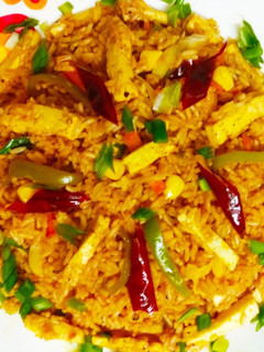 A picture of Schezwan Paneer & Veg Fried rice.