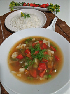 A picture of Vegetables stew with rice.