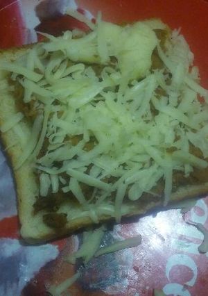 Una foto de Mollete de Frijoles con Chilorio al Horno