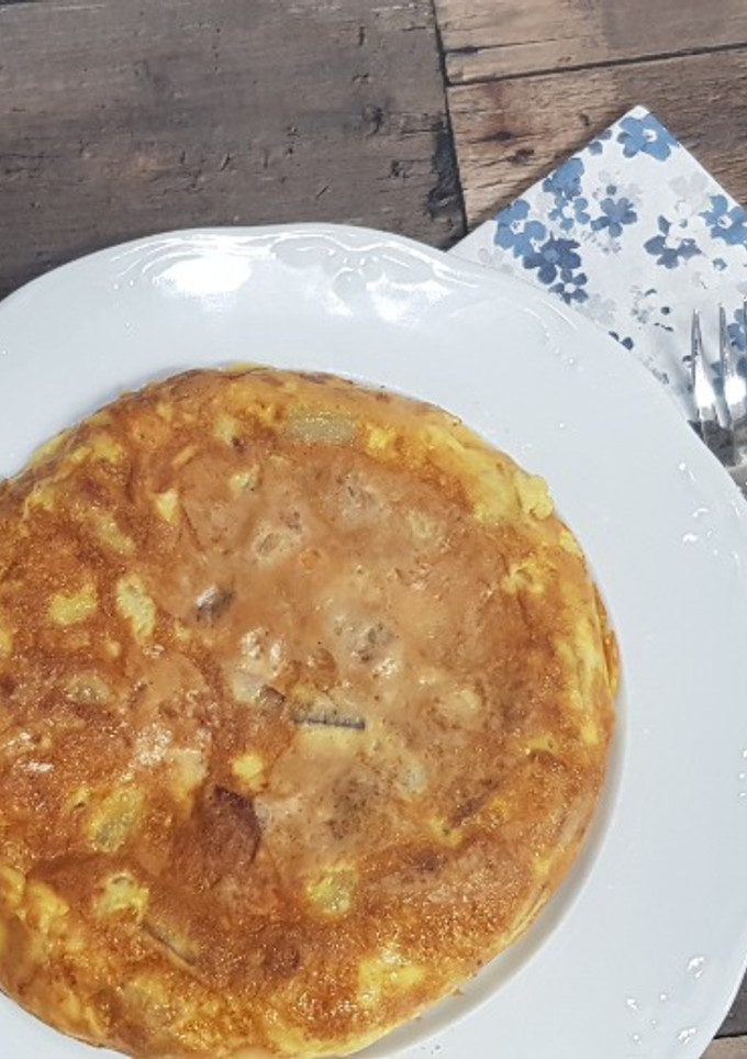 Una foto de Tortilla de patatas con queso de cabra