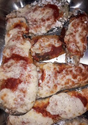 Una foto de Milanesas de berenjena + guarnición