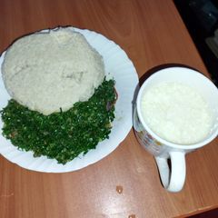 A picture of Ugali greens and mala.