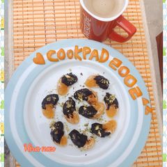 A picture of Half Oranges Dipped Chocolate With Coffee.