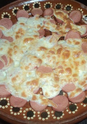 Una foto de Salchichas gratinadas con tequila al estilo ranchero