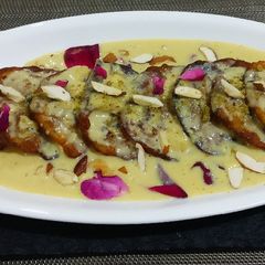 A picture of Sweet potato malpua with rabri.