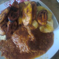 Onion stew with Fried plantain/yam A picture of Onion stew with Fried plantain/yam.