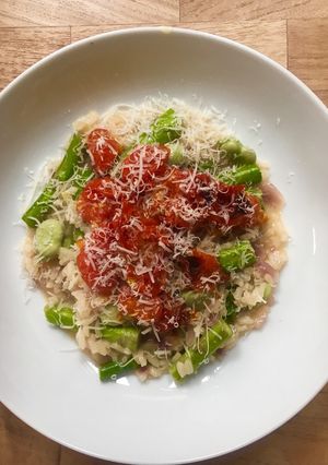 A picture of Broad Bean and Asparagus Risotto with Slow Roasted Tomatoes.