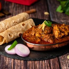 A picture of Highway Dhaba Chicken Curry.