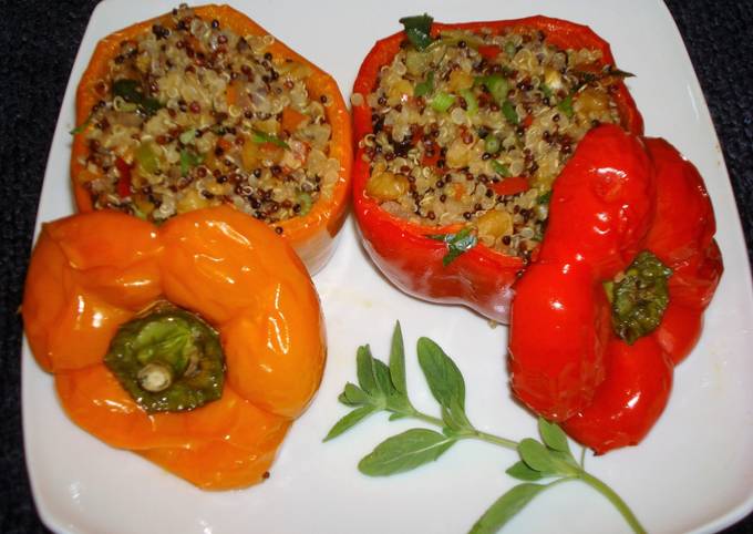 Stuffed peppers with three colors quinoawalnuts and raisins