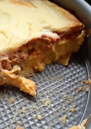 Una foto de Pastel de polenta y puré