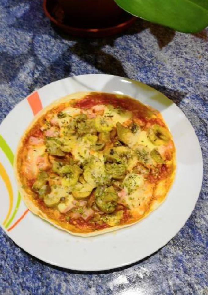 Una foto de Pizza en base de fajitas