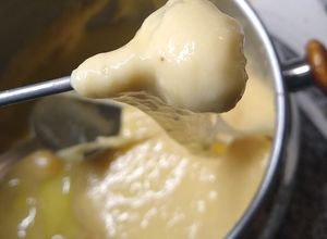 Una foto de Fondue de queso