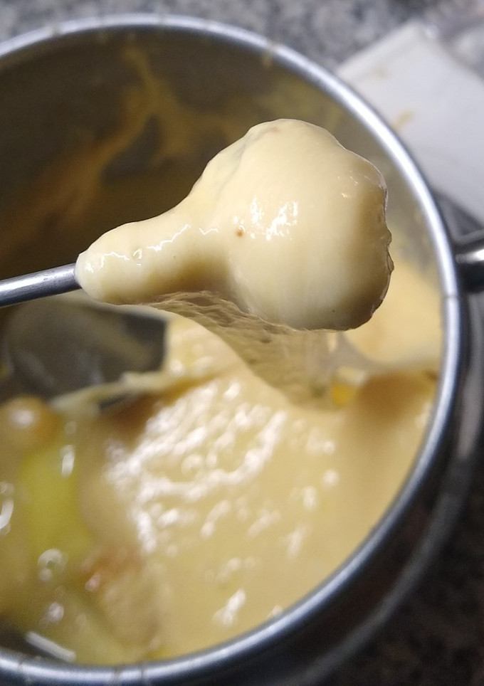 Una foto de Fondue de queso
