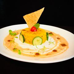 A picture of Khichdi with Achari Raita.