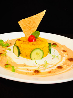 A picture of Khichdi with Achari Raita.