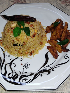 புளியோதரை சாதம் (Puliyotharai satham recipe in tamil) செய்முறை முக்கிய புகைப்படம்