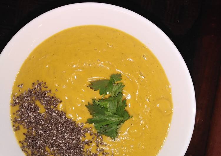 Recipe of Appetizing Pumpkin soup with chia seeds toppings, garnished with coriander