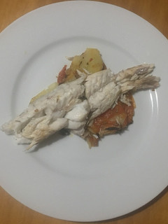 Una foto de Lubina al Horno con patatas