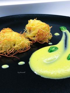 Foto di Bocconcini di coda di rospo con crema di peperoni piccante