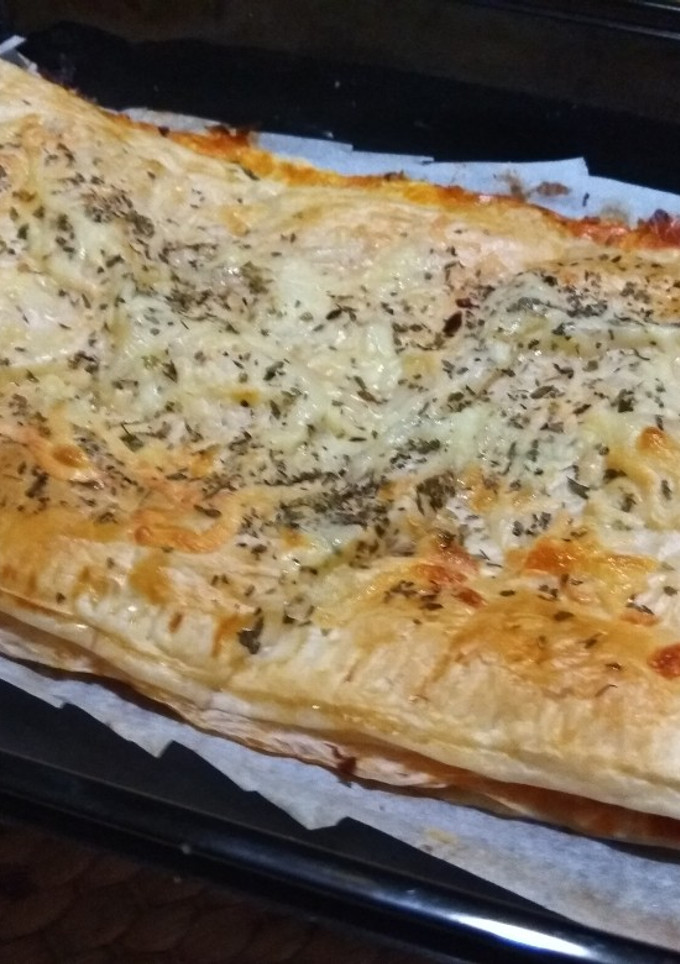 Una foto de Empanada de bacon, queso, pavo y tomate