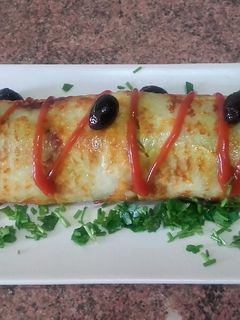 Una foto de Rollo de patata relleno con pollo y verdura / comida de Marruecos