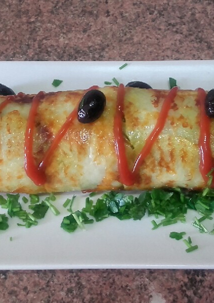 Una foto de Rollo de patata relleno con pollo y verdura / comida de Marruecos