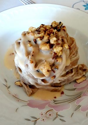Foto di Tagliatelle al caffè con fonduta al parmigiano