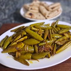A picture of Simple stir fry Parwal ki sabji with ghee roti.