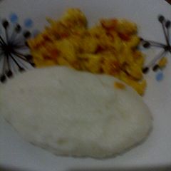 A picture of Egg tomatoes onion.