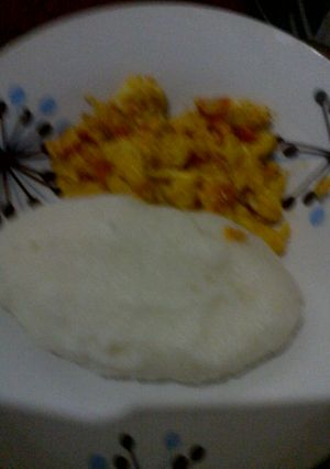 A picture of Egg tomatoes onion.