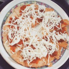 A picture of Nachoes Pizza.