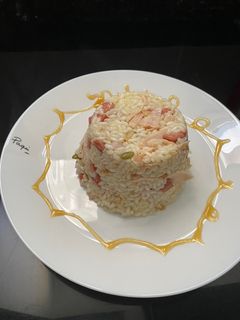 Una foto de Arroz tres delicias con frutos secos
