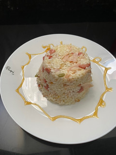 Una foto de Arroz tres delicias con frutos secos