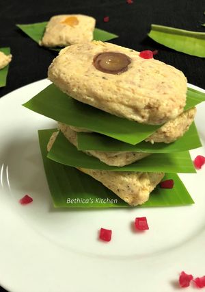 A picture of Bhapa Sandesh Paturi (Steamed Sandesh in Banana Leaf).