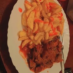 A picture of Chips with pork.