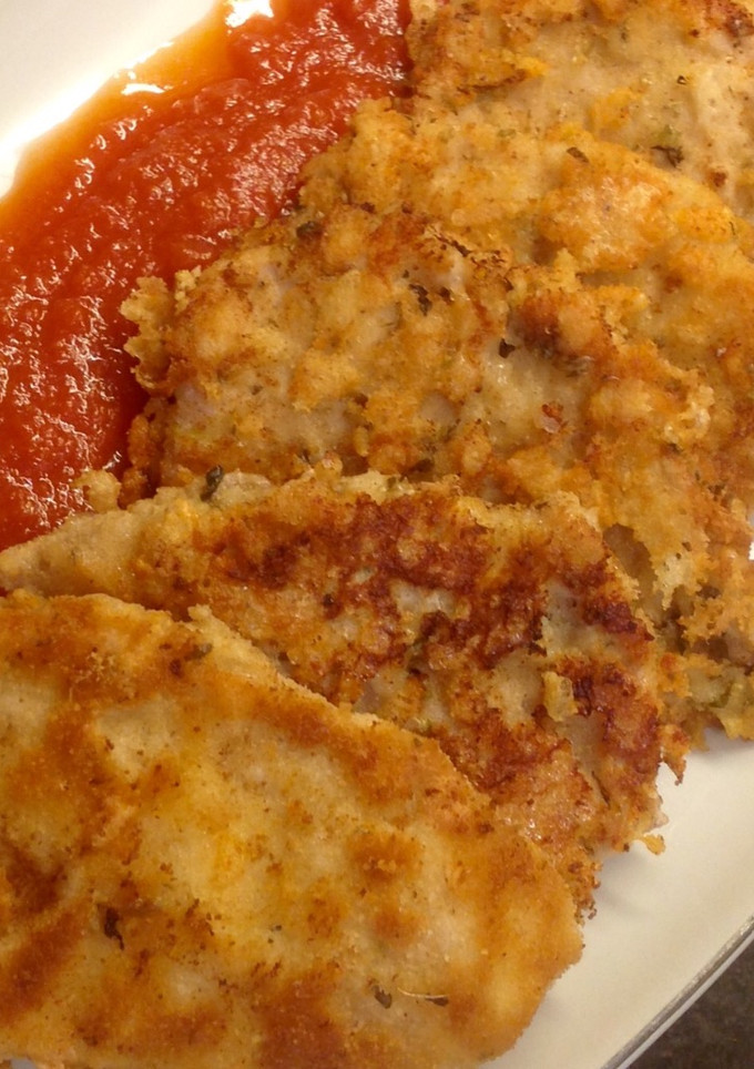 Una foto de Lomo rebozado al queso y orégano