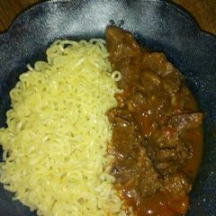 A picture of Indomie with Liver stew.