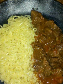 A picture of Indomie with Liver stew.