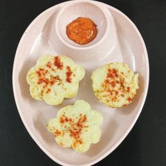 Cheesy Capsicum Dhokla Bites A picture of Cheesy Capsicum Dhokla Bites.