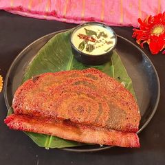 A picture of Red lentils Ragi beetroot Dosa.