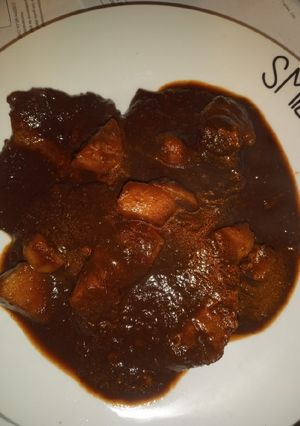 Una foto de Chuleta fresca en salsa pasilla