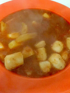 Una foto de Sepia en salsa de caldo de pescado