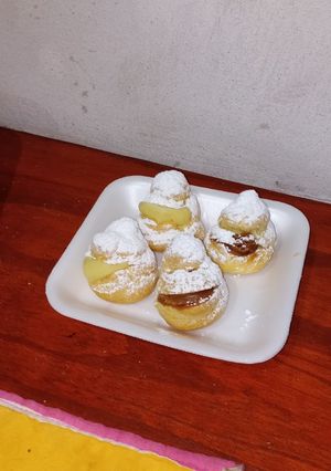 Una foto de Bombitas de crema pastelera y dulce de leche