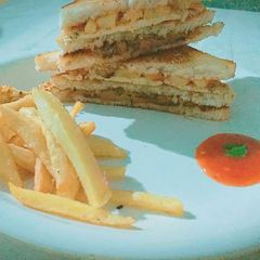 A picture of Shami Kabab sandwich.
