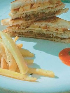 A picture of Shami Kabab sandwich.