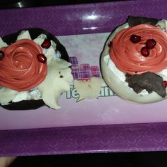 A picture of Fruit cream salad in chocolate balls.