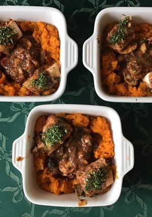 Une photo de Dos de cabillaud aux champignons et purée de carottes